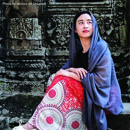 Woman with blue scarf